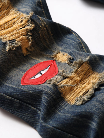 Men Cartoon & Letter Patched Detail Ripped Frayed Jeans