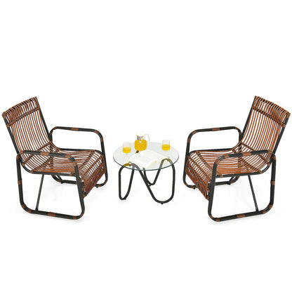 3-Piece Rattan Patio Furniture Set Featuring Two Armchairs and a Glass Coffee Table